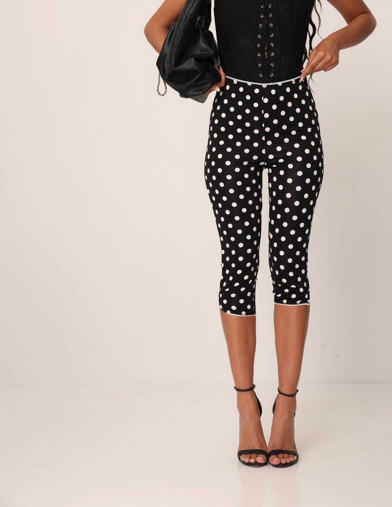 PANTALONI CAPRI POIS CHARLES NERI